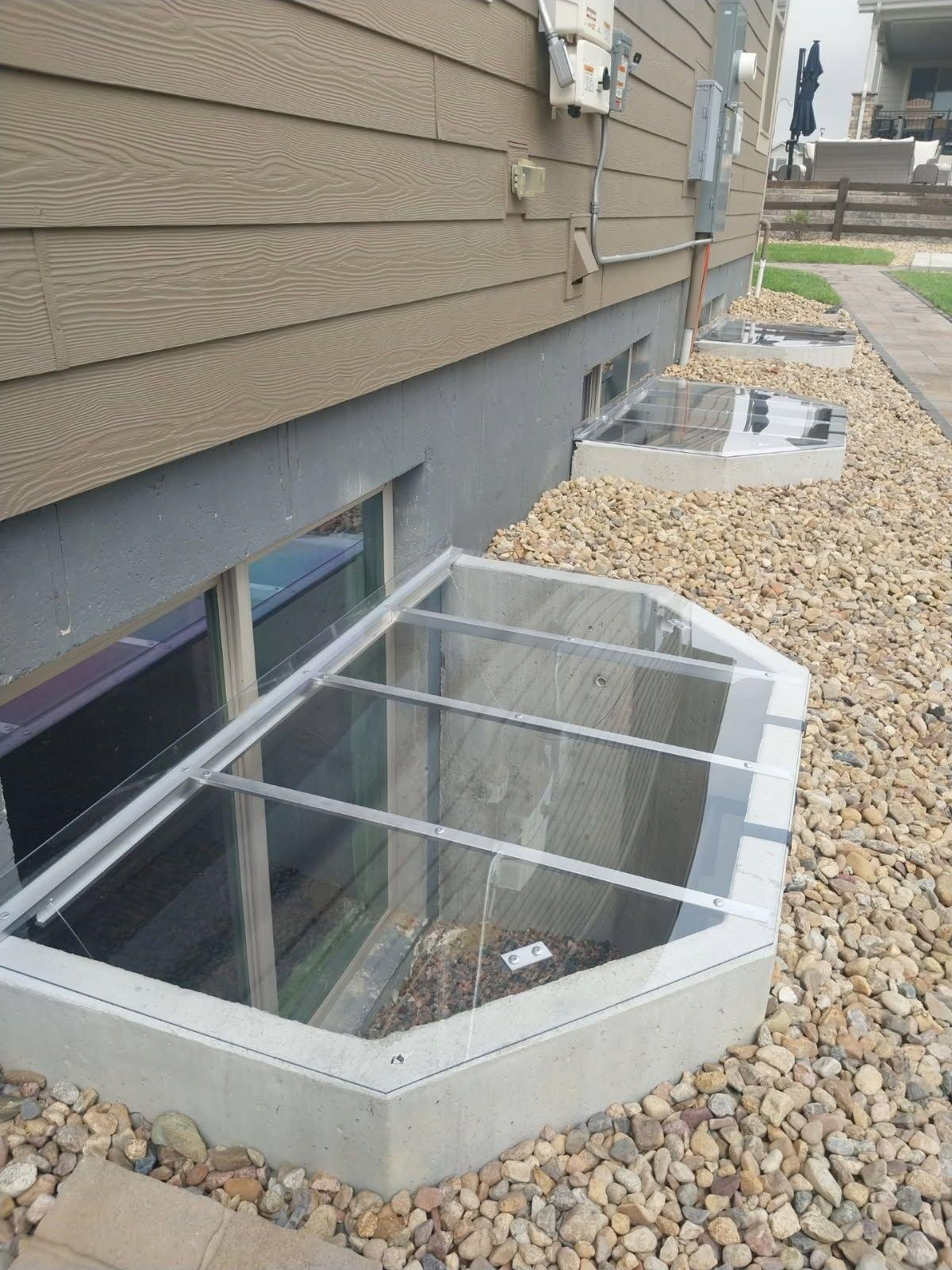 Window well leak repair with complete drainage solution